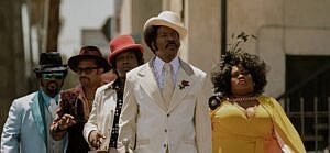 A photo showing the 'Dolemite' cast.