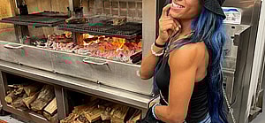 Sasha Banks near flaming grill