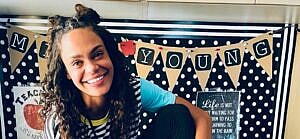 Michelle Young has a bright and gorgeous smile on her face.