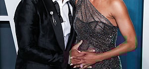 Russell Wilson and Ciara smiling.