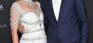 Paris Hilton and Carter Reum smiling.