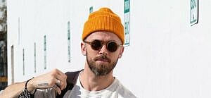 DWTS Pro Artem Chigvintsev Arrives To Rehearsal Wearing Orange Beanie