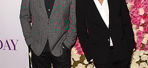 Bob Saget and John Stamos smiling.