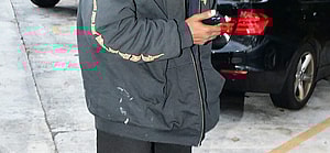 Kanye West is seen for the first time since becoming legally single as he hits up a tattoo shop in Miami