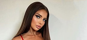 Larissa Trownson gets ready for Christmas in red lingerie