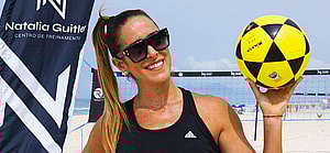 Natalia Guitler holding up a volleyball