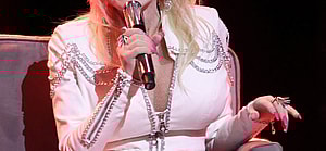 Dolly Parton onstage at Fan Fair X