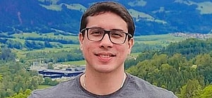 A close up portrait of Ayres Sasaki smiling