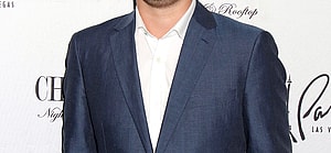 Chase Chrisley posing on the red carpet.