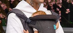 Justin Bieber carrying his baby
