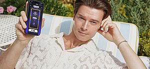 Patrick S. posing with a phone.