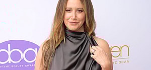 Ashley Tisdale posing on the red carpet.