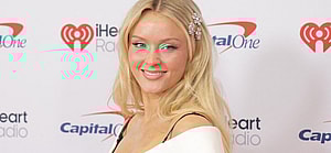 Zara Larsson posing on the red carpet.