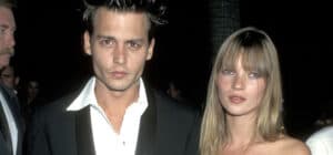 Johnny Depp and Kate Moss at a formal event