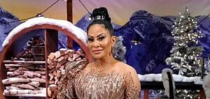 A photo showing Jen Shah in a brown sparkle dress with a gorgeous smile on her face.