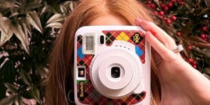 Jenn Todryk snaps a picture with a limited-edition Scotch Brand instant print camera