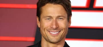 Glen Powell smiling