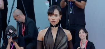 Taylor Russell posing on the red carpet