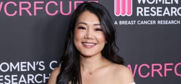 Crystal Kung Minkoff posing on the red carpet.
