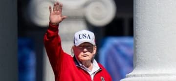 President Trump waves from the White House