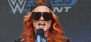 Becky Lynch talking into the microphone
