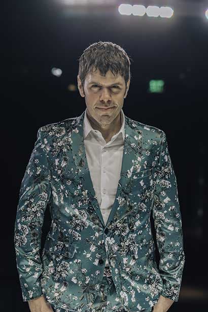 Perez Hilton in green suit