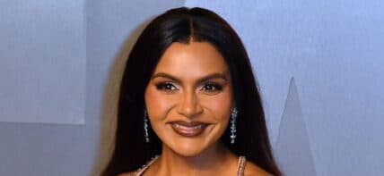 Mindy Kaling posing on the red carpet.