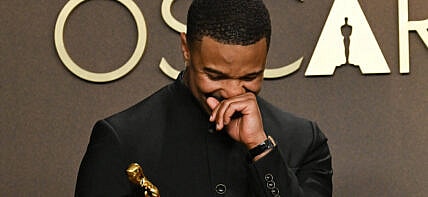 Michael B Jordan with his Oscar Award