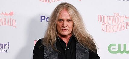 Sebastian Bach poses for photos