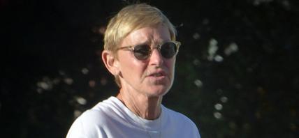 Ellen DeGeneres with her phone in her hand