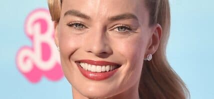 Margot Robbie smiling close up