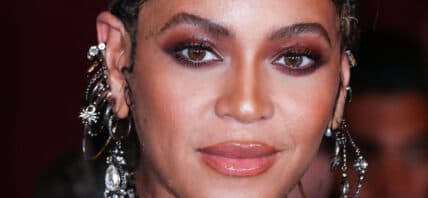 Beyonce Knowles Carter wearing an outfit by Alexander McQueen and Lorraine Schwartz jewelry arrives at the World Premiere Of Disney's 'The Lion King'