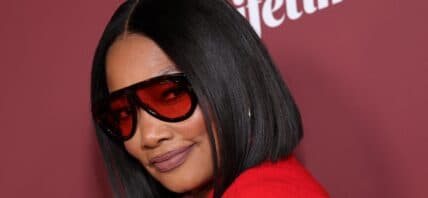 Garcelle Beauvais posting on the red carpet.