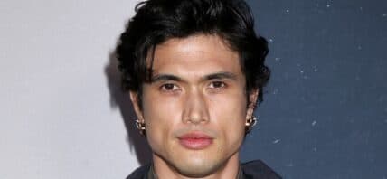 Charles Melton posing