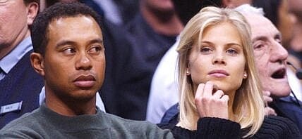 Tiger Woods and his ex girlfriend Elin Nordegren at basketball game