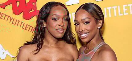 Malika/Khadijah Haqq posing on the red carpet.