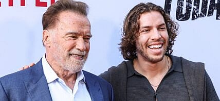 Arnold Schwarzenegger and Joseph Baena at the Los Angeles Premiere Of Netflix's 'FUBAR' Season 2