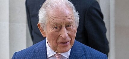 King Charles outside Buckingham Palace