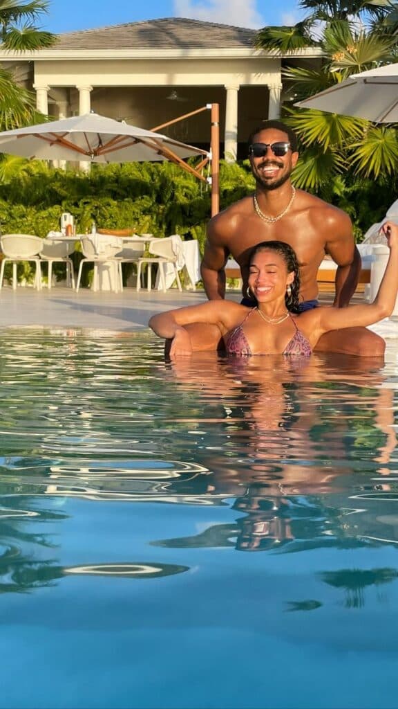 Lori Harvey and Michael B. Jordan in the pool.