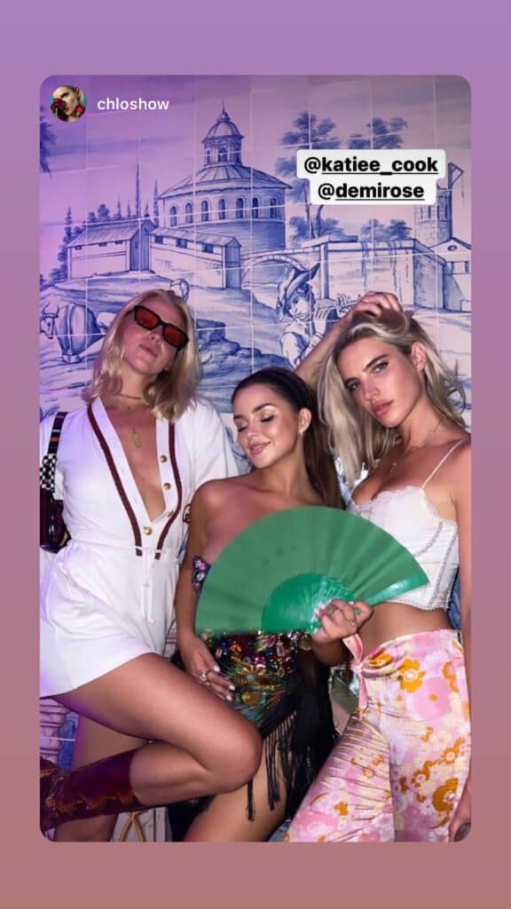 Demi Rose posing with her friends.
