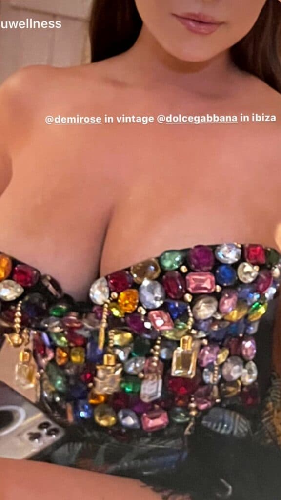 Demi Rose taking a selfie.