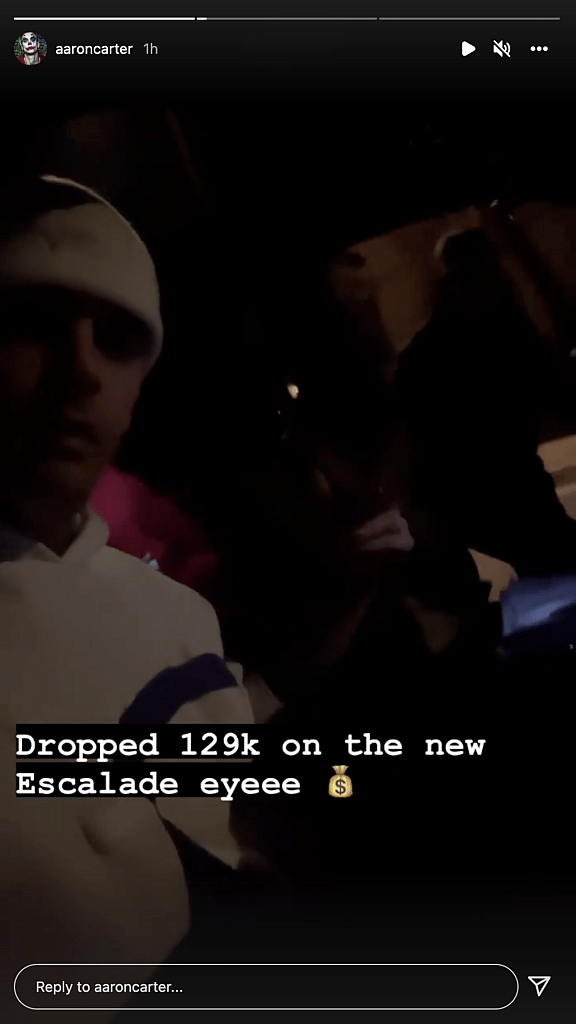 Aaron Carter inside his new car.