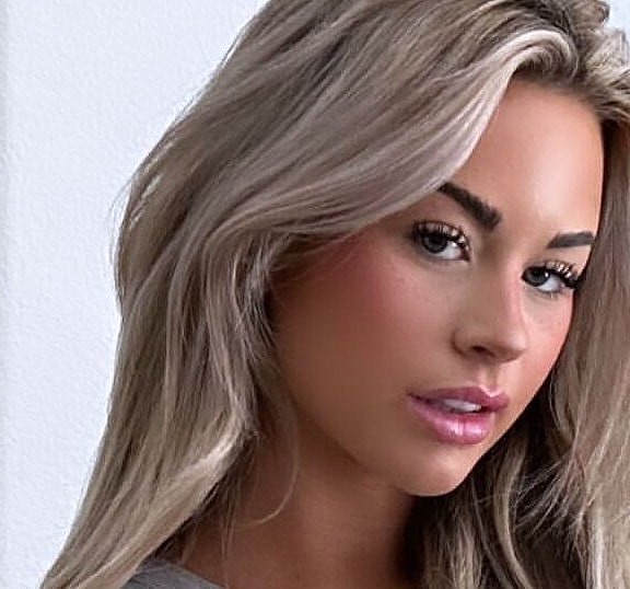 Emily Elizabeth posing for the camera.