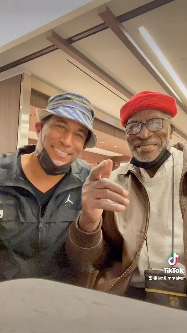 John Amos with friends and family