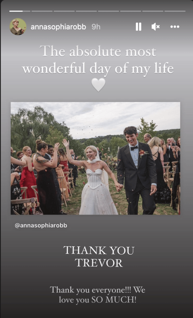 AnnaSophia Robb and husband Trevor Paul walking down the aisle