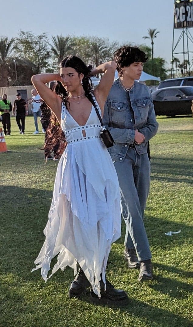 Landon Barker and Charli D apos Amelio arrive to watch his father apos s first show With Blink 182 in 9 years at Coachella