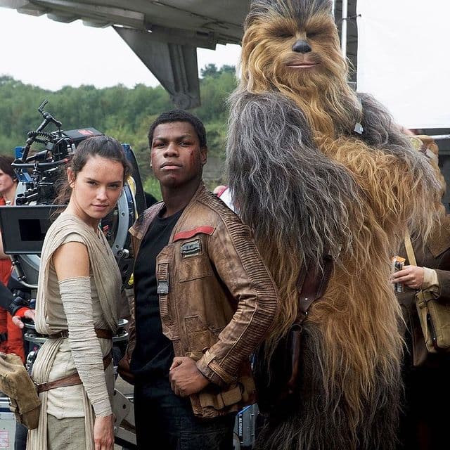 Daisy Ridley with John Boyega and Chewbacca