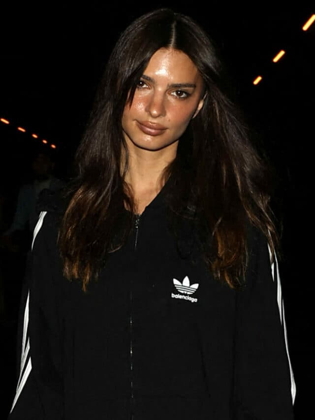 Emily Ratajkowski wears an Adidas Tracksuit while leaving the Balenciaga show in Paris