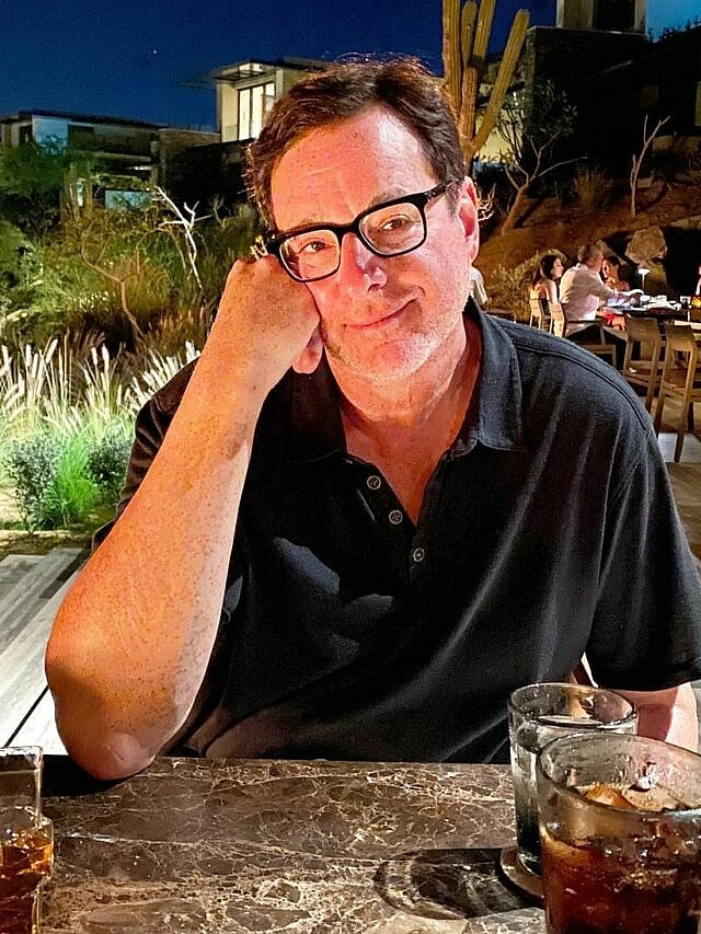 Bob Saget smiling.