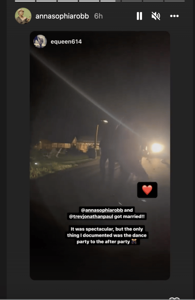 AnnaSophia Robb and wedding guest dancing in the street at night